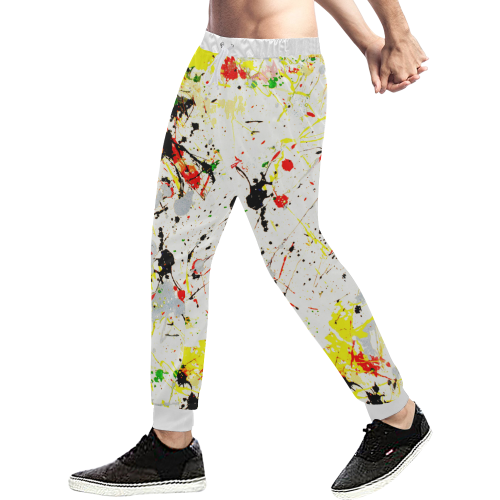 Yellow & Black Paint Splatter Men's All Over Print Sweatpants (Model L11)
